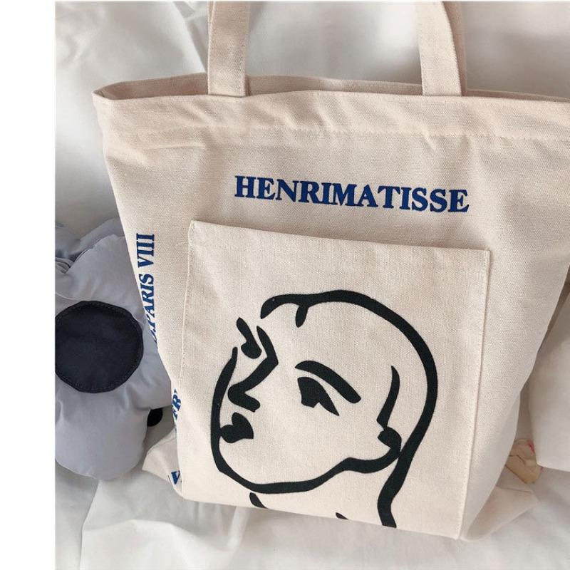 Simple female avatar printed canvas bag shoulder bag outer pocket cloth bag commute