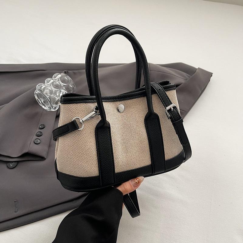Summer new fashion contrast large-capacity hand-held bucket bag women's simple casual commuter shoulder body bag