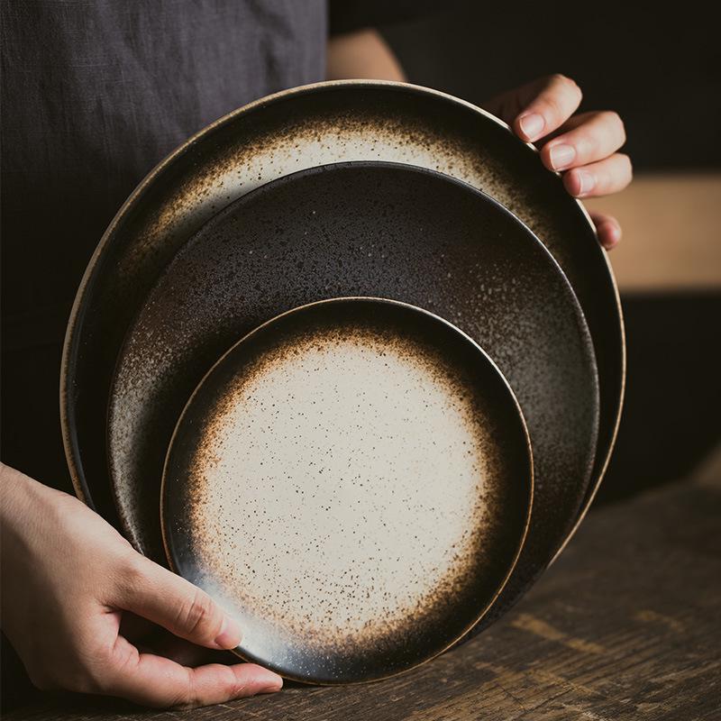 Retro Japanese Ceramic Plate: Creative Black Glaze Dish for Home and Restaurant