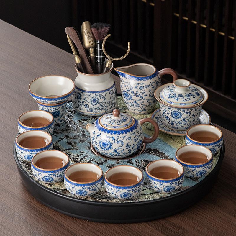 

Small apartment household Ru kiln ceramic kung fu tea set, a complete set of tea table, hand-held beam teapot, tea cup, tea tray set