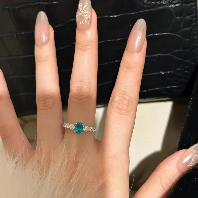 Bagues ovales en pierre précieuse bleu mer incrustée brillante pour femmes luxe léger Paraiba Simplicité bague de mode fête bijoux fins