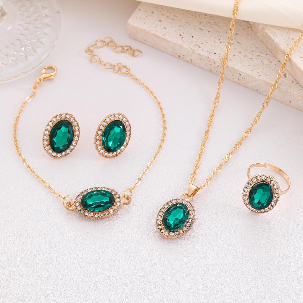 Europejski i Amerykański Zestaw Biżuterii Ślubnej z Owalnymi Diamentami w Kształcie Kropli Wody: Naszyjnik, Kolczyki i Pierścionek.