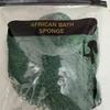 Afrikanisches Nylon-Peeling-Badetuch mit hoher Elastizität und langem Streifendesign.