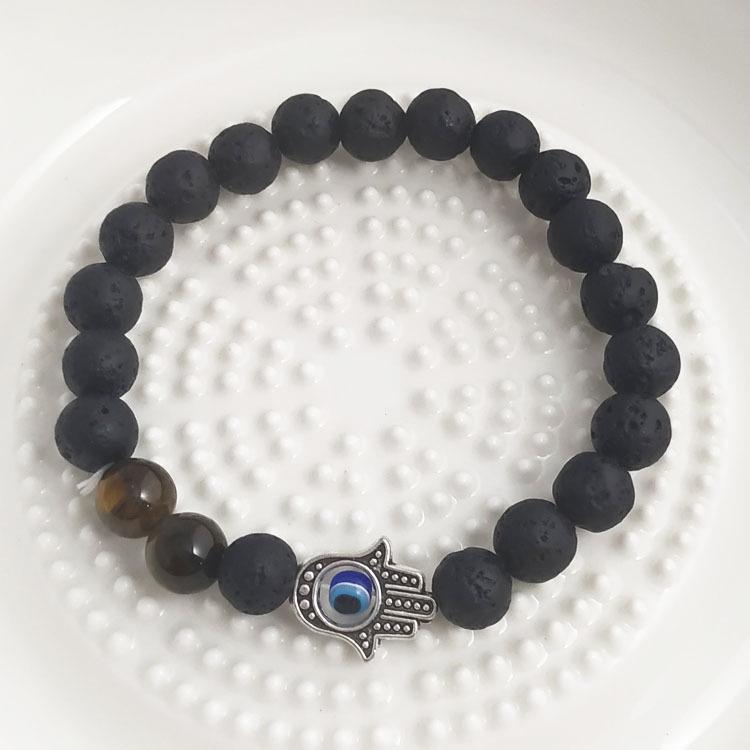 New Volcanic Stone Beaded Bracelet with Lion Head and Elephant Design