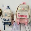 Personalized Hand-Embroidered Snap Backpack Travel Waterproof 2025 New Large Capacity Flower Decoration Simple Bags for Students