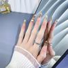 Gemstone Diamond Press-On Nails: Luxurious Gold Nude Gradient with Cat Eye and Whitening Effect.