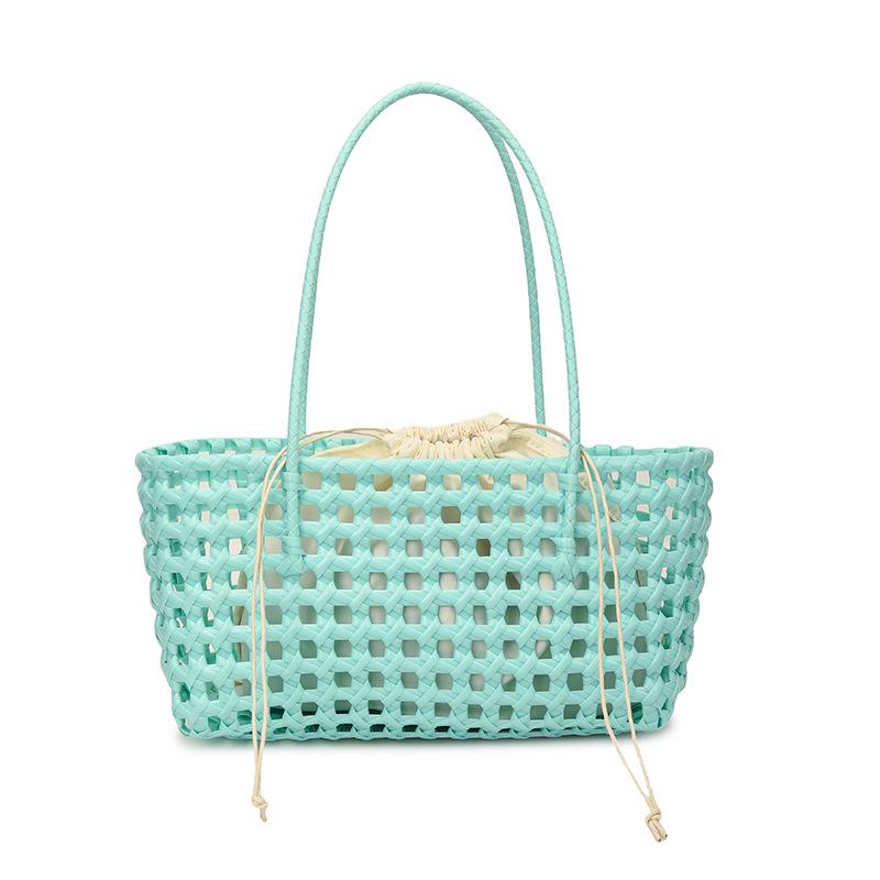 Bolsa da Mãe: Uma Bolsa de Ombro Elegante, de Trama Aberta, para Mulheres, Adequada para Uso Casual.