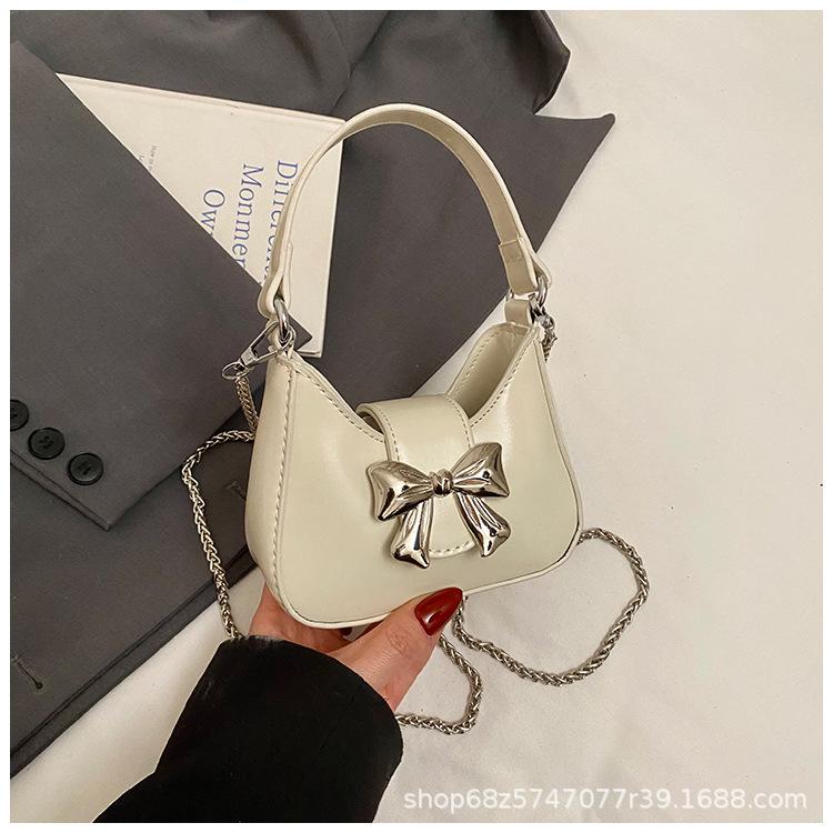 Foreign style mini small bag women 2025 new Korean version versatile bow portable shoulder crossbody small bag mouth red envelope
