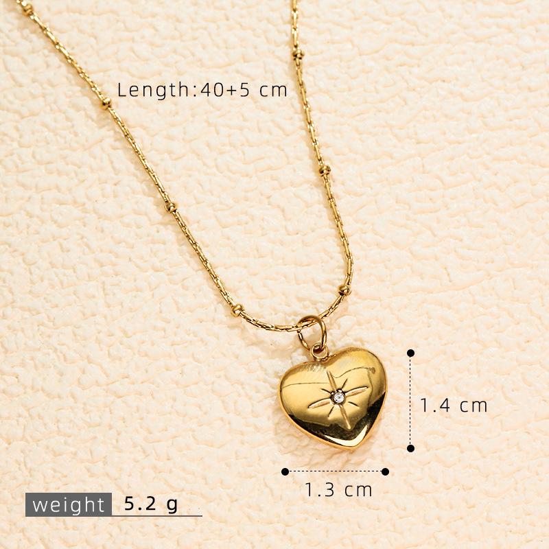 Stainless Steel Gold-Plated Love Heart Necklace with Inlaid Diamonds
