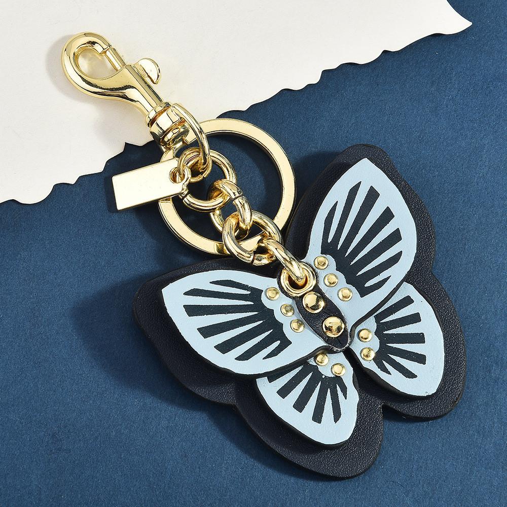 

Tea Rose Butterfly Keychain With Leather Chain For Handbags And Backpack Decor Blue A