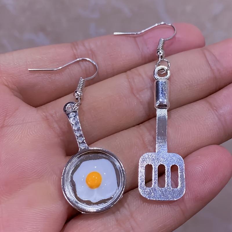 A Pair of Cute Asymmetrical Earrings Shaped Like a Frying Pan And Spatula, Perfect for Daily Wear for a with a Playful Heart