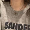 "European & American Double-Layer Love Necklace: Hip-Hop Inspired Long Sweater Chain for Women"