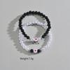 2-teiliges Set aus minimalistischen schwarzen und weißen Perlen gemischt mit Liebe gestapelten Damenarmbändern