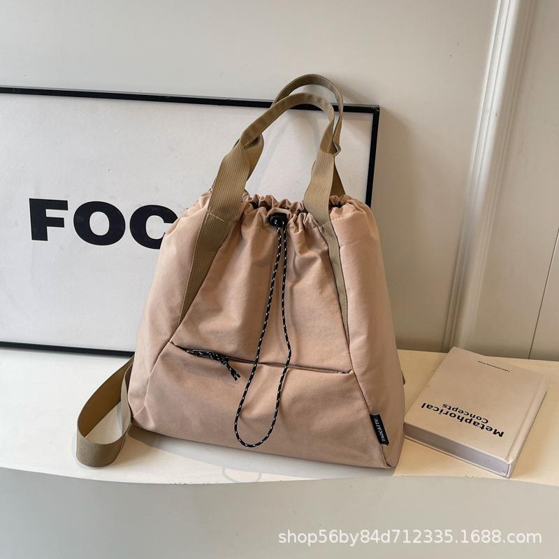 Fashion and leisure large-capacity tote bag women's 2025 spring portable versatile canvas bag multi-pocket shoulder bag