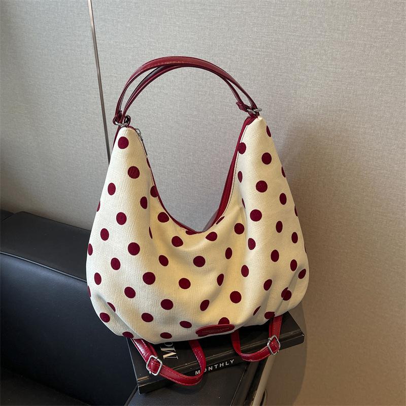 

Niche горошек женский рюкзак для поездок на работу модный универсальный повседневный контрастный цвет сумка подмышкой 2024 новая сумка-тоут 41*13*22