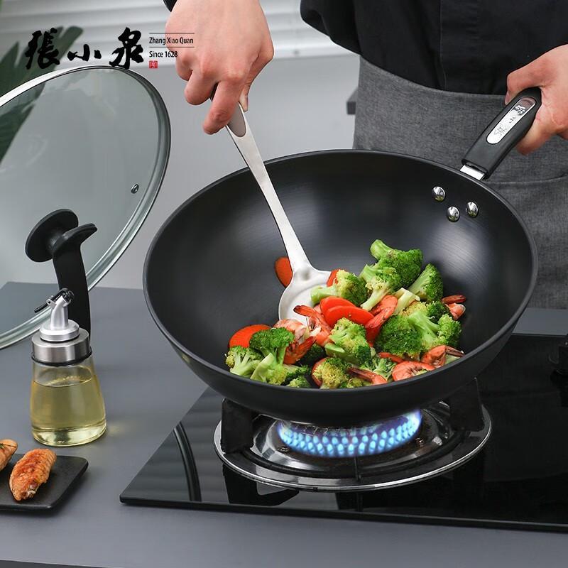 

Zhang Xiao Quan Multi-Stove Refined Iron Wok