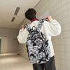 Schoolbag high-value trendy brand fashionable simple graffiti versatile schoolbag 3rd to 6th grade junior high school student backpack