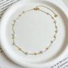 Golden Pearls French Charm Metal Beaded Necklace - Retro Clavicle Chain, Light Luxury, Versatile.