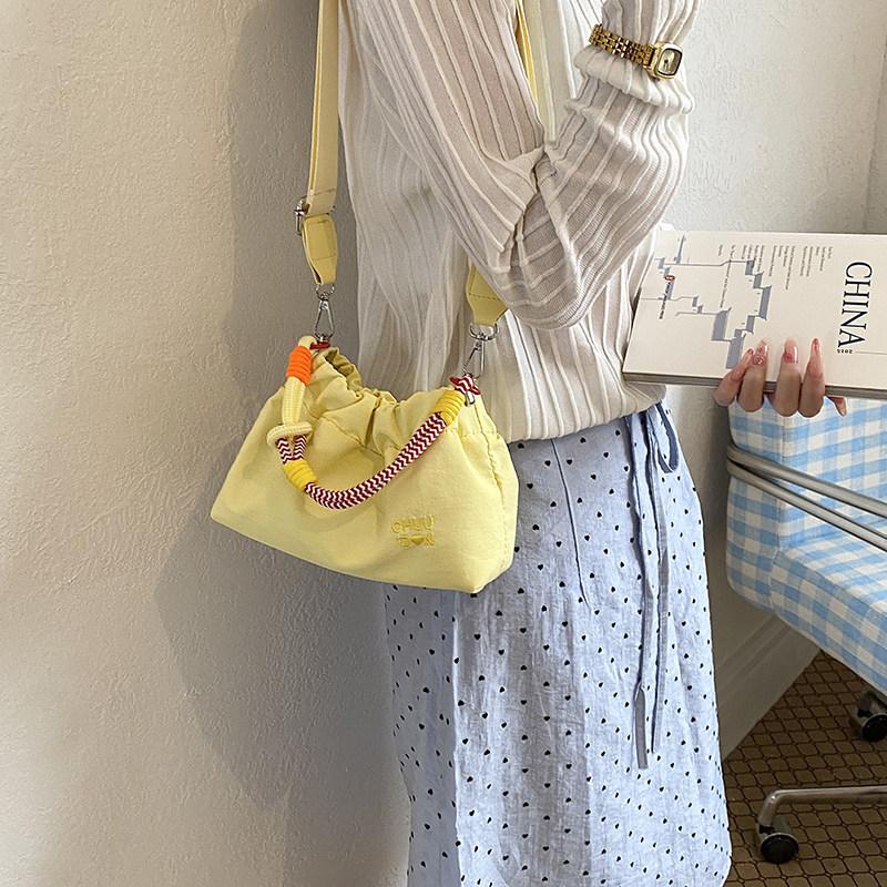 

Lightweight and versatile nyl fabric small bag for women2026New casual crossbody bag, super popular mini handbag for summer жовтий