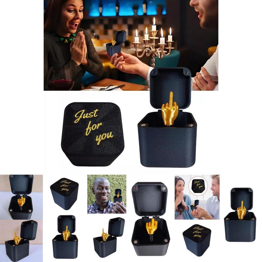 Geste de doigt d'honneur amusant dans une boîte Cadeau de Noël unique Design moderne minimaliste Pour tout le monde
