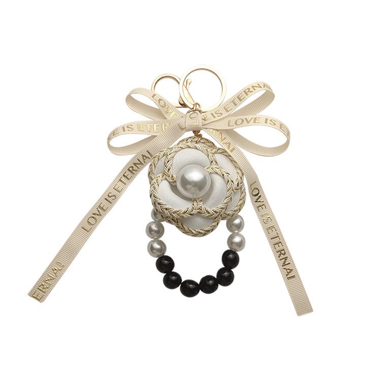 Elegant Black & White Pearl Camellia Keychain with Bow - Stylish Korean Flower Bag Charm