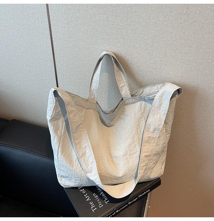 

Premium sense large capacity new fashion shoulder bag versatile commuter oblique span bag women грязно-белый