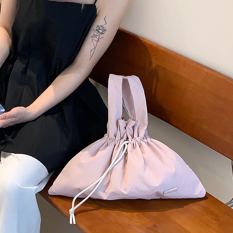 New Women's Retro Bundle Literary and Pastoral Handbag Solid Color Drawstring Commuter Bag