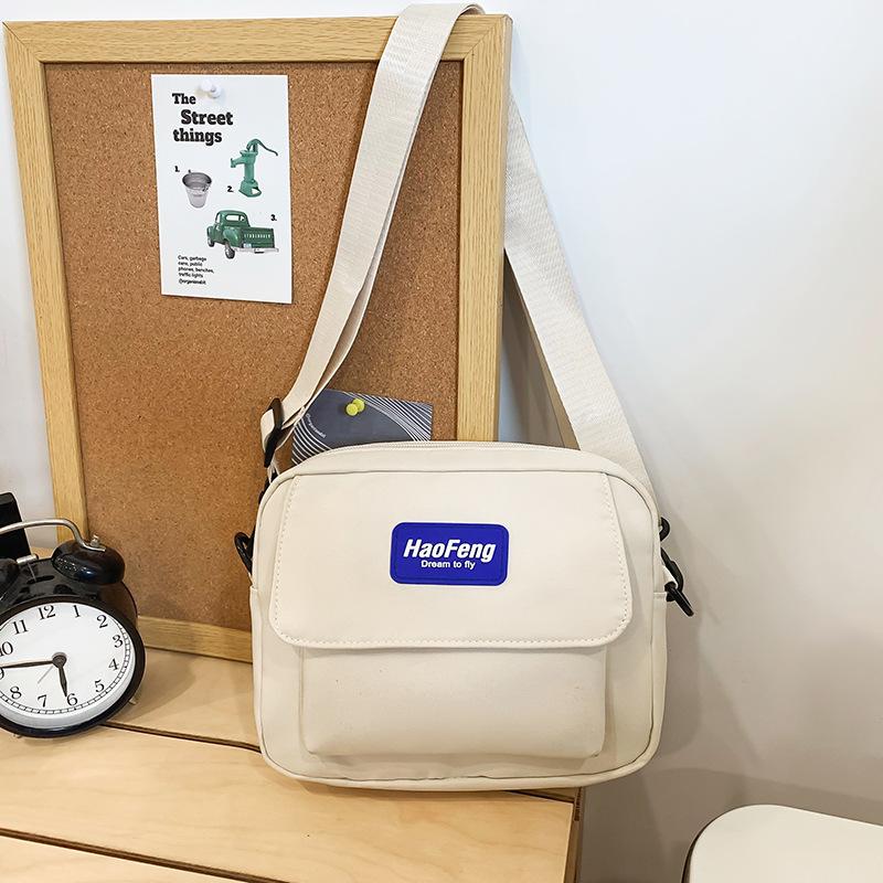 

Trendy Brand Canvas Small Bag Women S Leisure Commuter Messenger Bag Sports Couple Mobile Phone Bag чистий білий колір