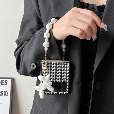 For Samsung ZFlip7 Pearl Handheld Phone Case Folding Screen with Flip Up Ins Style Dog Pendant Light Luxury Women