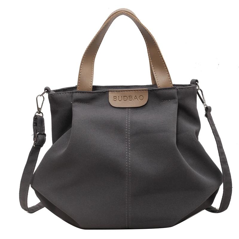 Women's casual monochromatic shoulder bag large capacity interior compartment zipper bags high quality