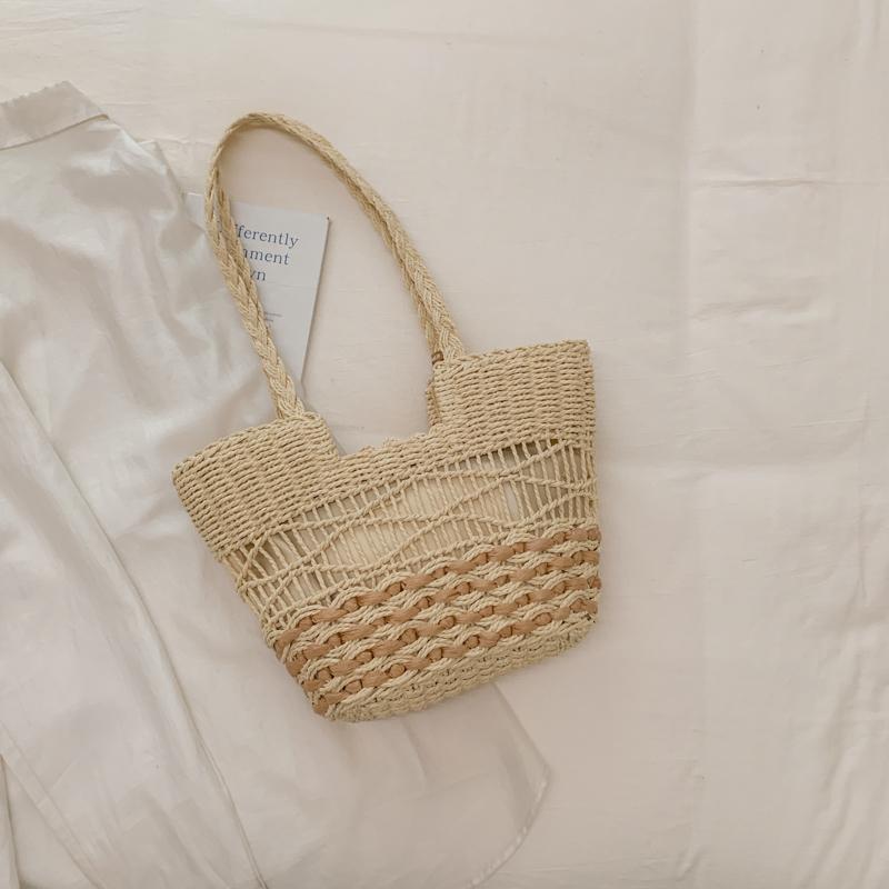 Handwoven Natural Fiber Tote Bag with Braided Handles and Open Weave Design