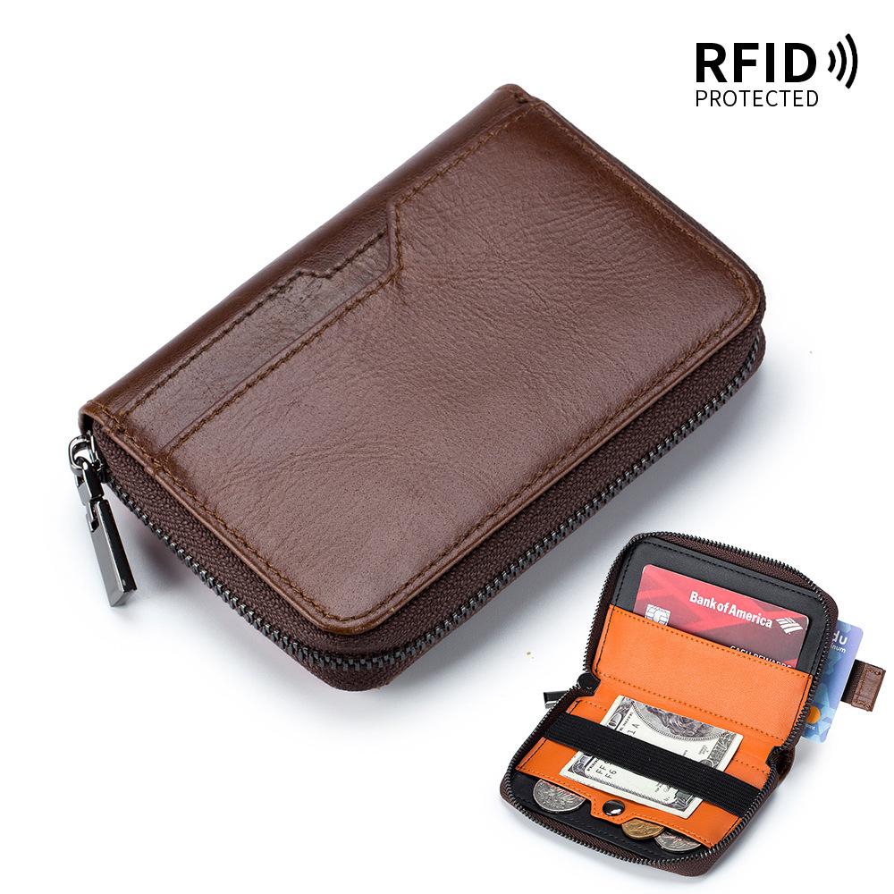 The First Layer of Cowhide Retro Men's Short Change Bag, European and American Vertical Dollar Clip, RFID Multi-card Pumping Card Bag.