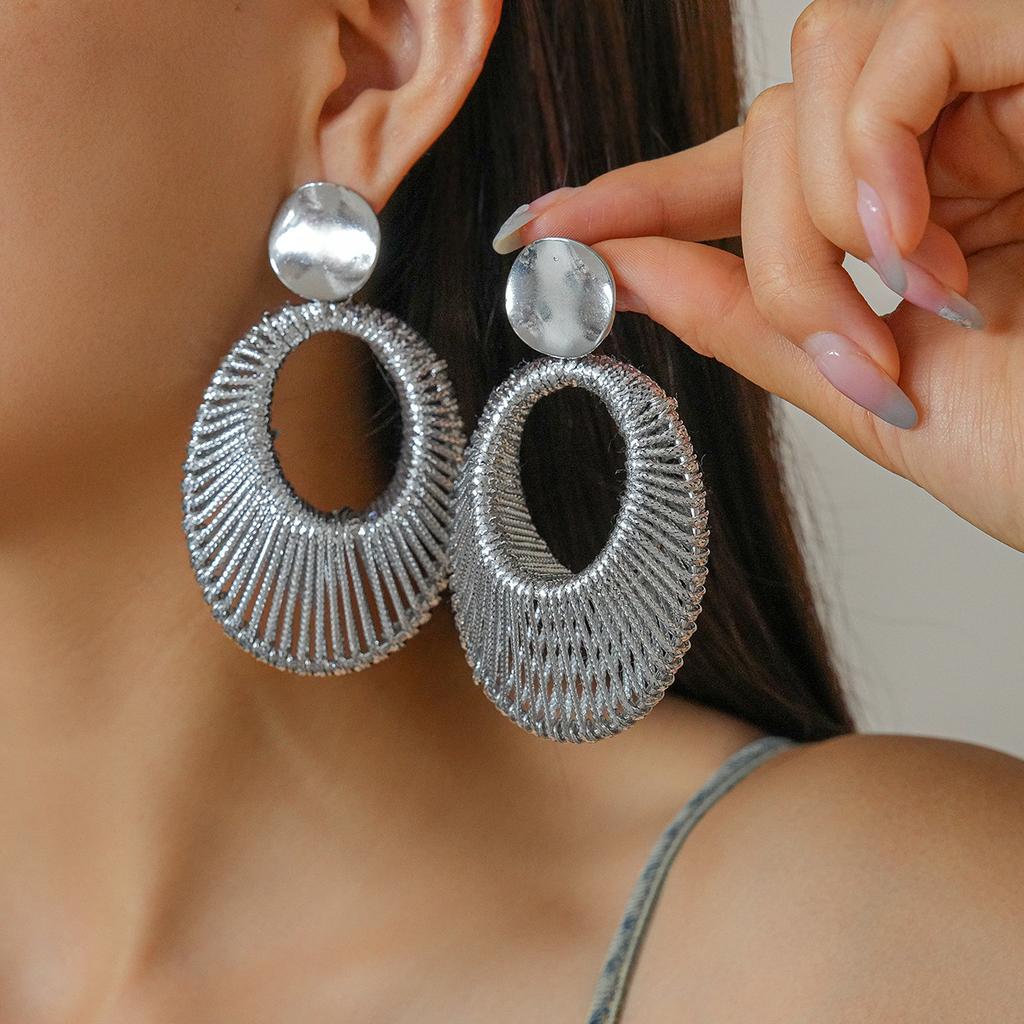 European and American personalized golden velvet woven hollow oval silver needle earrings niche earrings 