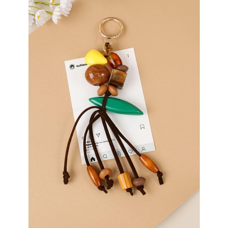 Creative retro casual versatile handmade beaded bag pendant Bohemian wood bead resin bead fringed braided rope pendant зелёный