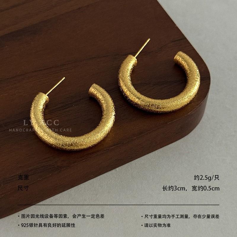 Gold and silver series zircon stud earrings two-color gold and silver hollow relief earrings light luxury cold shining versatile ears