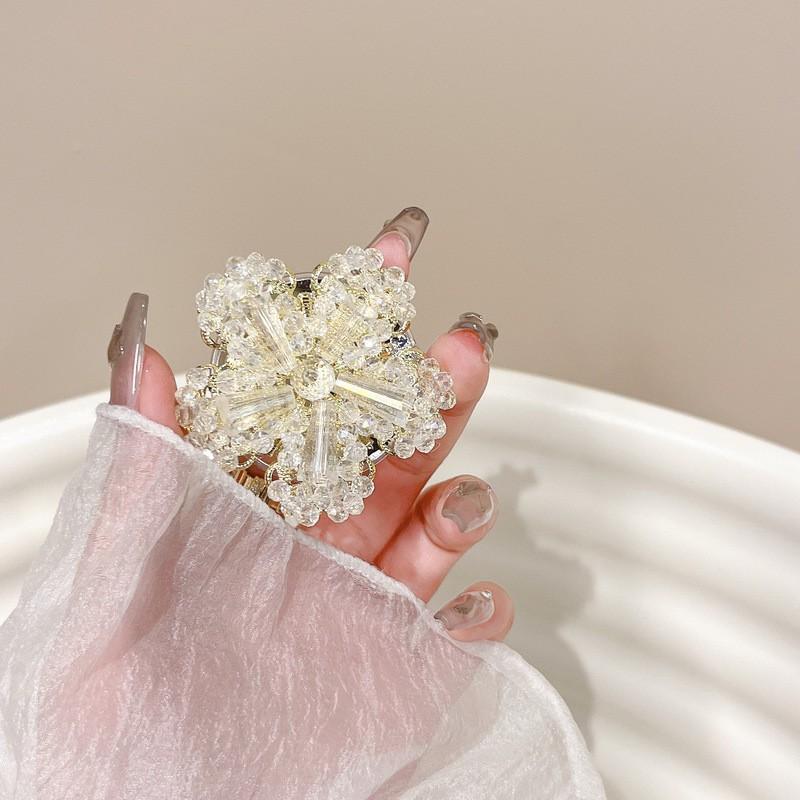 

Light Luxury Crystal Snowflake Phone Airbag Holder Korean Ins Style Small Fresh Flowers Rhinestones Watch TV Shows Desktop Stand