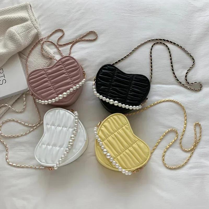 Heart-shaped solid chains shoulder bags classic fashion style sense of luxury popularity crossbody bags