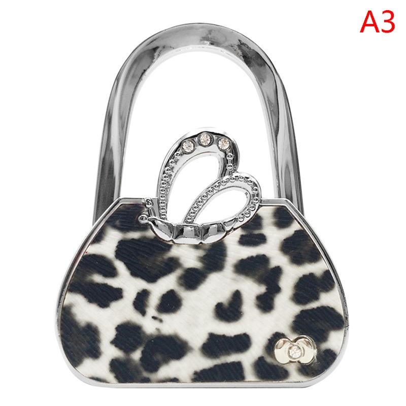 

Дизайн формы сумки Складная дамская сумочка Кошелек Сумка Вешалка для одежды Прочный Крючок для стола Стойки