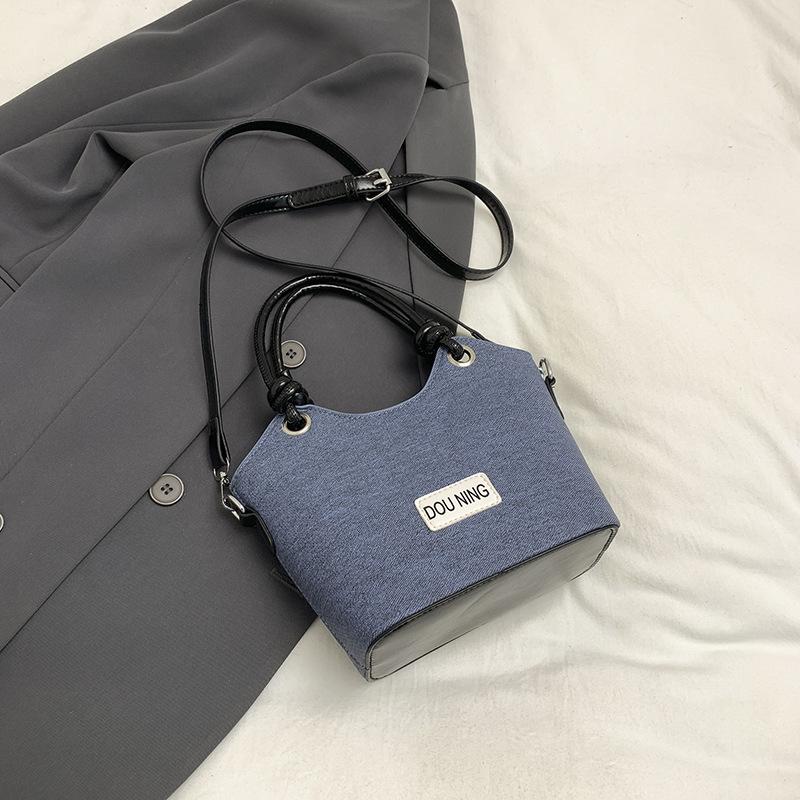 Denim vegetable basket small bag women's 2025 new autumn and winter fashion commuter bucket bag high-end sense contrasting color messenger bag