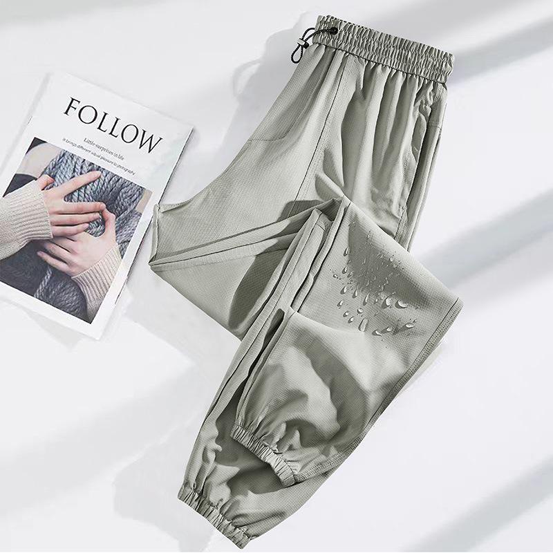 Pantalon de randonnée softshell coupe-vent et imperméable pour femmes de Bird, adapté aux sports de plein air et aux loisirs de printemps, d'automne et d'été.