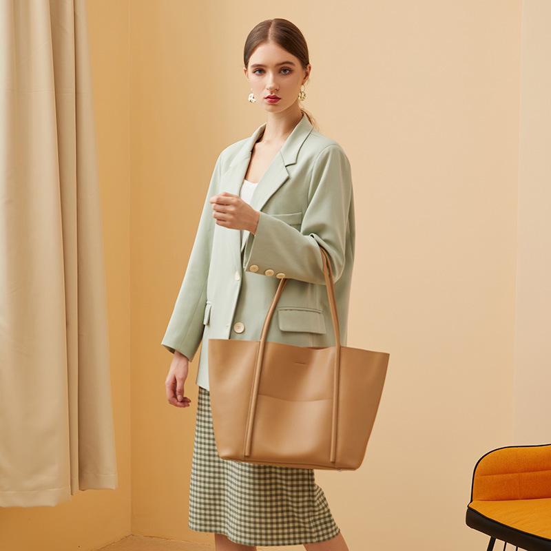 2024 Genuine Leather Women's Tote: Large Capacity Summer Handbag for Work and Commute.