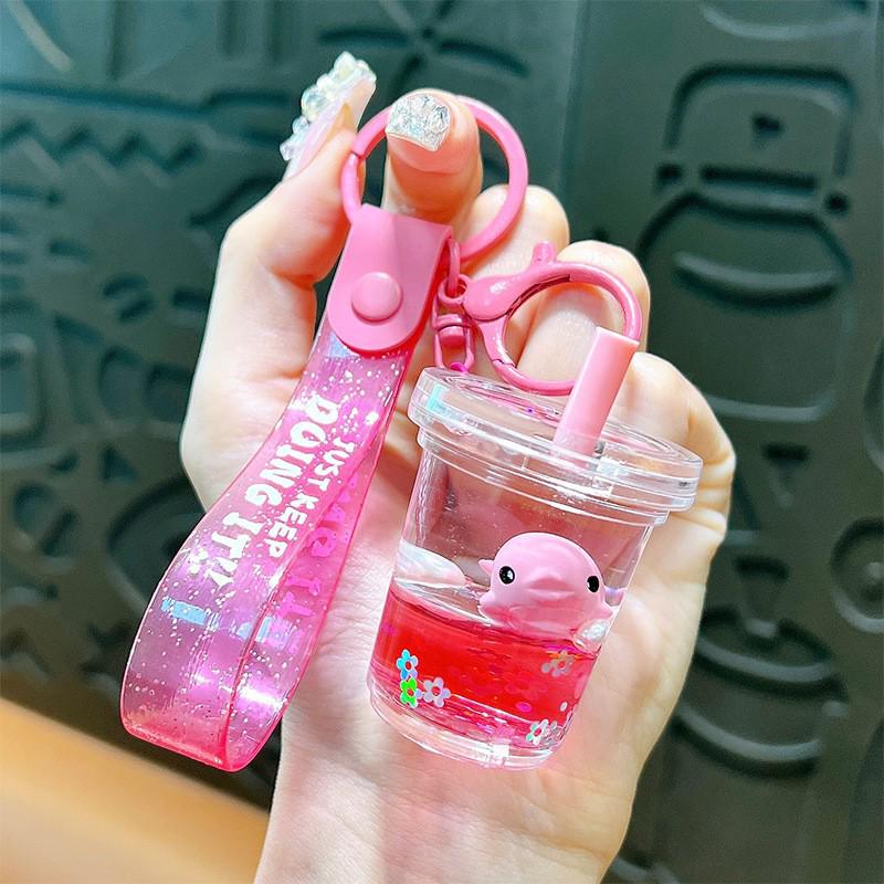 Exquisite Quicksand Panda Keychain: Cartoon Oil-Filled Doll Bag Pendant and Car Accessory