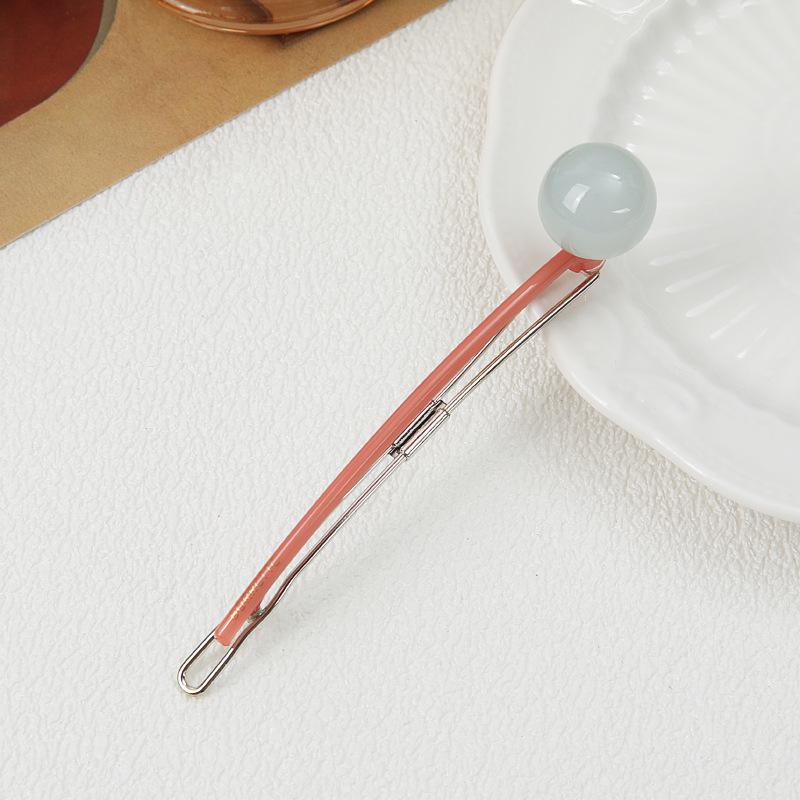 2024 Trend: Round Ball Acrylic Lollipop Hair Clip – Simple, Celebrity-Style Accessory