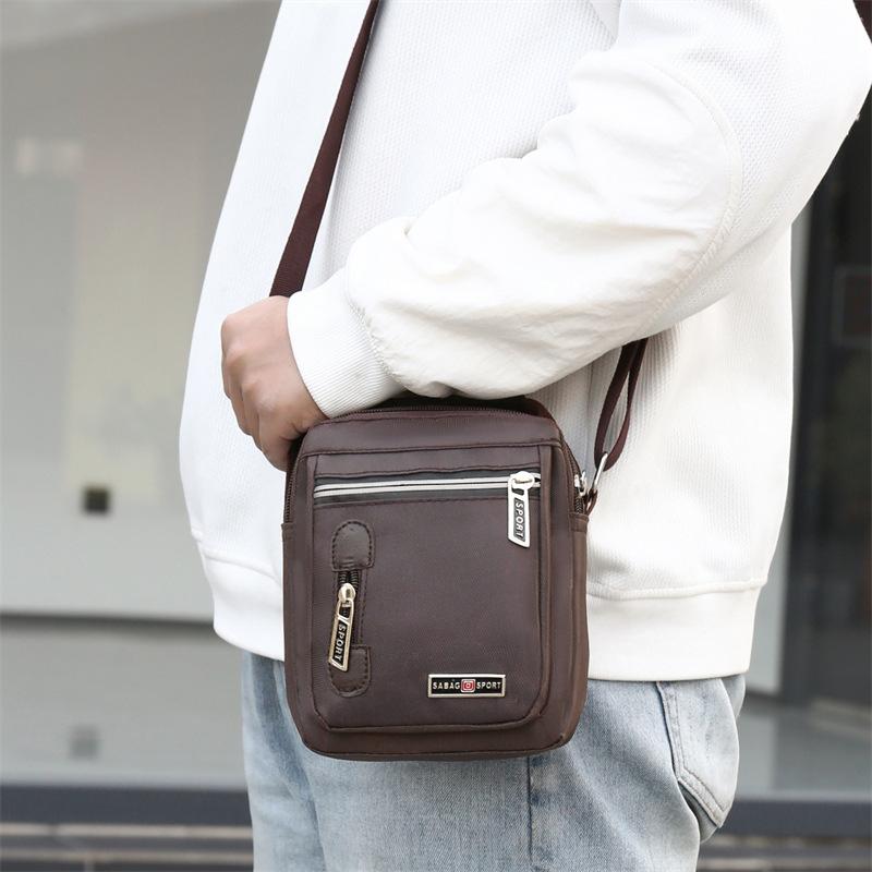 Nylon Lightweight Simple Messenger Bag New Multi Layer Storage Joker Shoulder Bag Business Commuter Hand Held Men's Bag