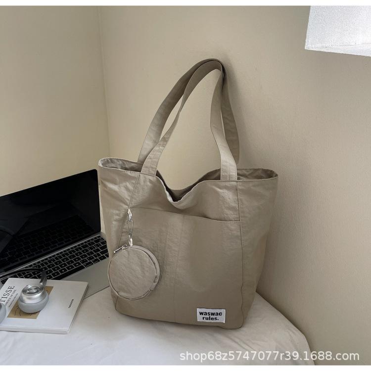 Japanese new waterproof nylon casual spring and summer shoulder bag women's design sense large-capacity commuter tote bag