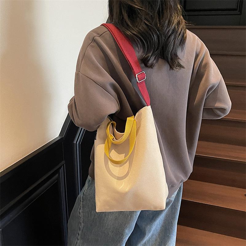 Simple canvas bag, men's and women's tide large-capacity portable shoulder bag, casual student class messenger bag