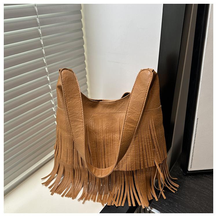 

2025 лето новая сумка-мессенджер женская высококлассная ретро-модная сумка на плечо с бахромой трендовая нишевая сумка подмышку коричневый