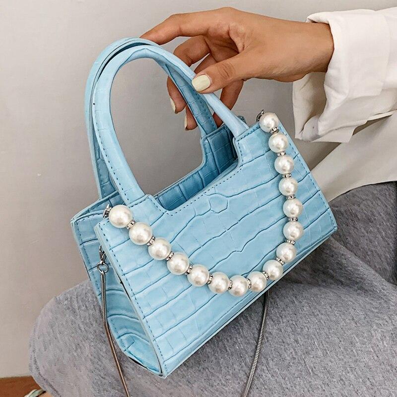 teal leather handbolsas