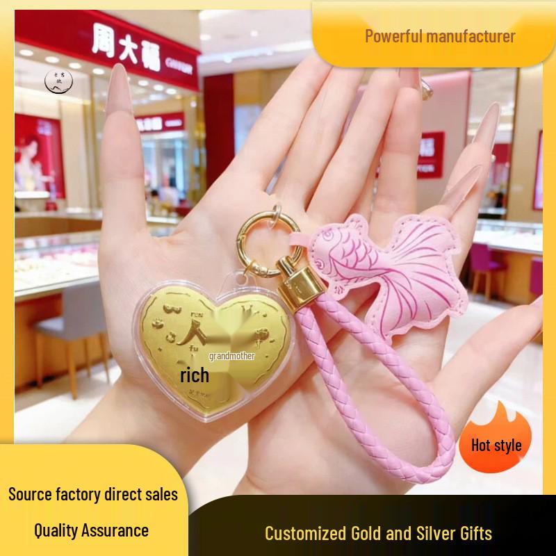 Pure Gold Peace and Joy Goldfish Leather Keychain Pendant