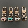 Modern Sewing Machine Glass Keychain With Alloy Pendant For Gift Giving And Daily Use